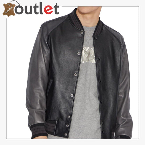 Side view of the black leather letterman jacket showing ribbed cuff and hem